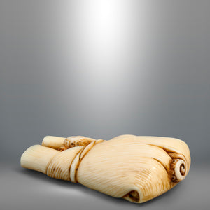 Netsuke – Octopus wrapped in a bamboo leaf