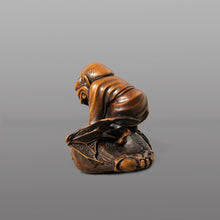 Load image into Gallery viewer, Netsuke - Demon on winged mokugyo drum